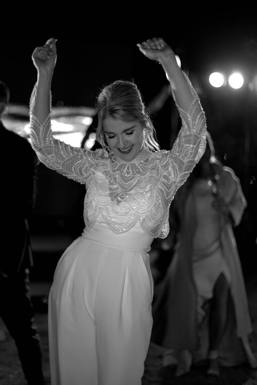 bride dancing at night